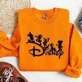 a pair of shoes and a sweatshirt with mickey mouse on it