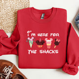 a red sweatshirt with mickey mouses on it