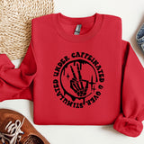 a red sweatshirt with a black print on it