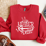 a red sweater with the words never better on it
