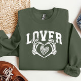 a green sweatshirt with the words lover and two crossed hands