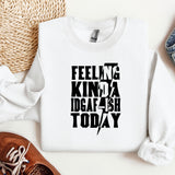 a white sweatshirt with the words feeling kinda in black on it
