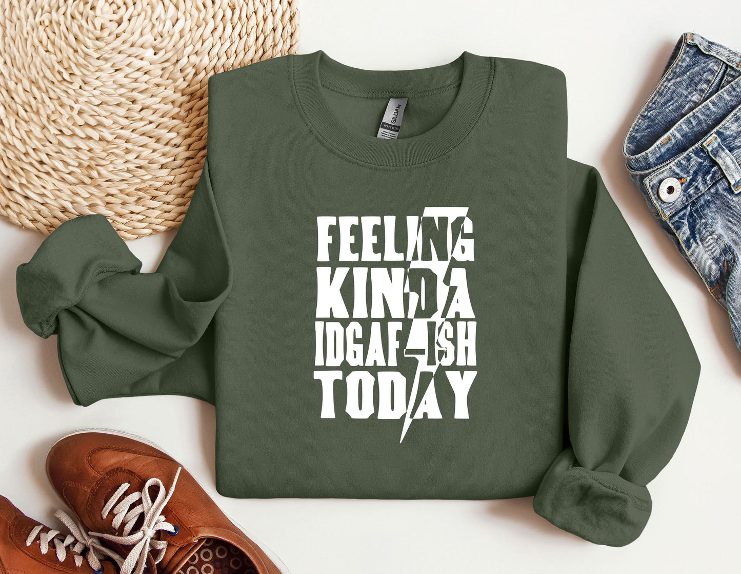 a green sweatshirt with white writing on it