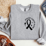 a gray sweatshirt with a black ribbon on it