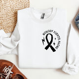 a white shirt with a black ribbon on it