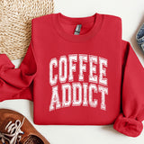 a red sweatshirt with the words coffee addict on it