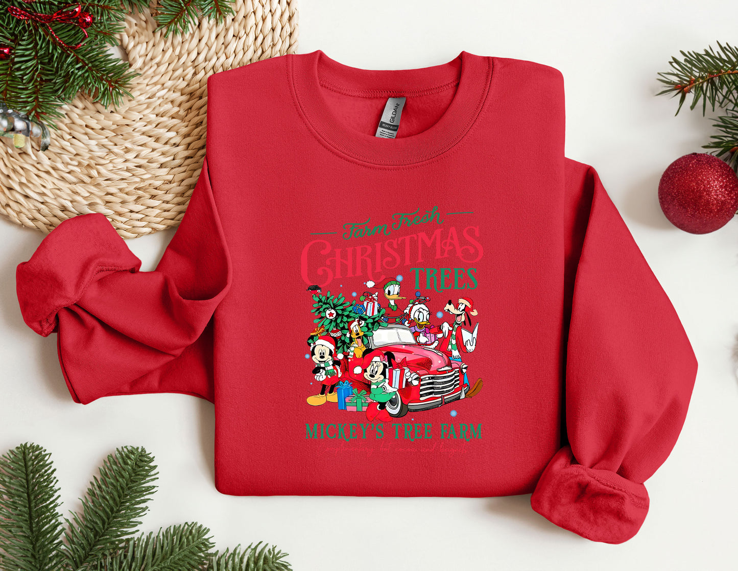 a red christmas sweater with a santa clause on it