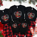 a group of three matching mickey mouse shirts