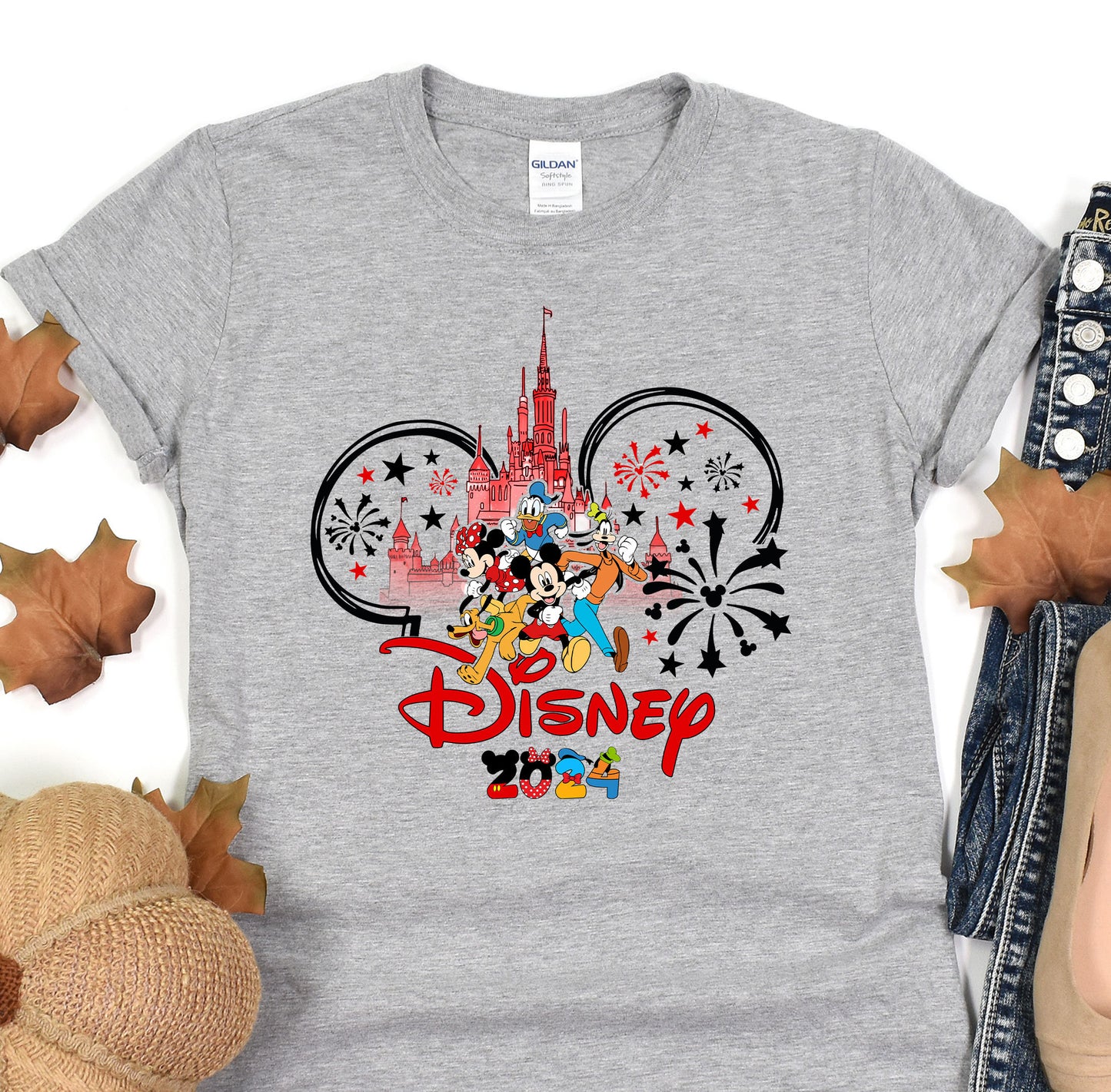 a gray shirt with mickey mouse on it