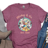 a t - shirt with mickey and friends on it