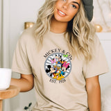 a woman wearing a mickey and mickey mouse t - shirt