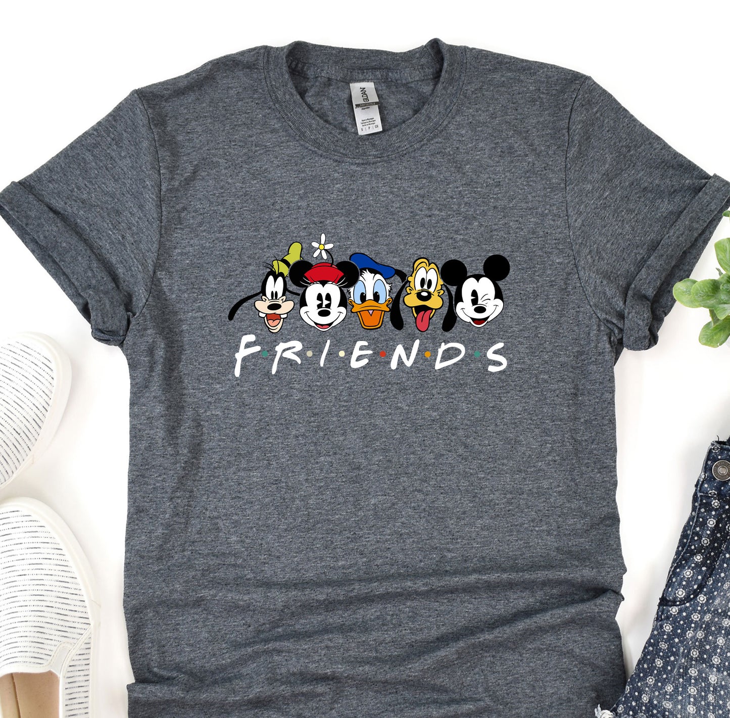 a t - shirt with mickey mouse and friends on it