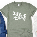 a t - shirt with the disney logo on it next to a pair of jeans