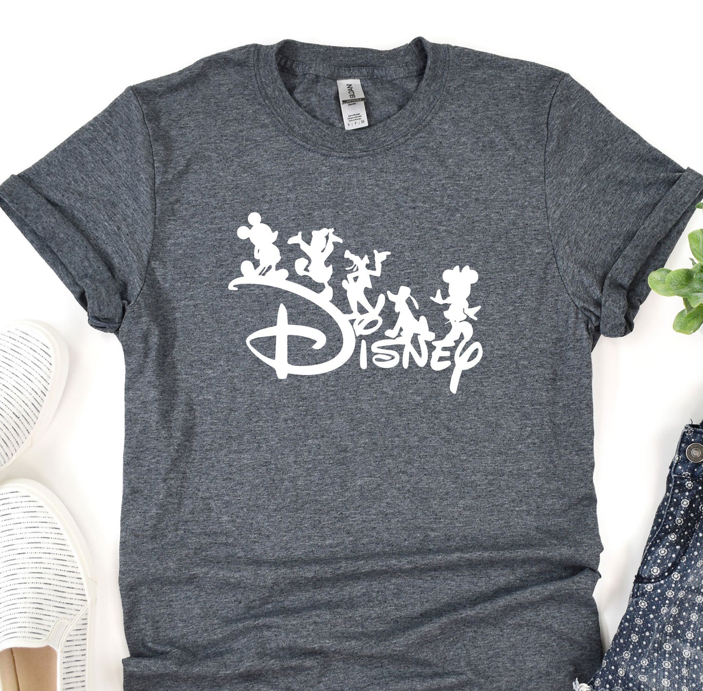 a t - shirt with the disney logo on it