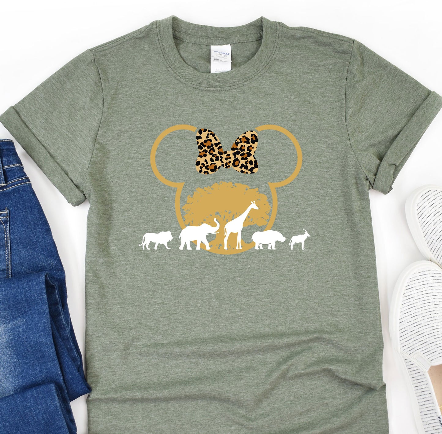 a t - shirt with an image of a mickey mouse with giraffes