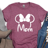 a t - shirt that says mom with a bow on it
