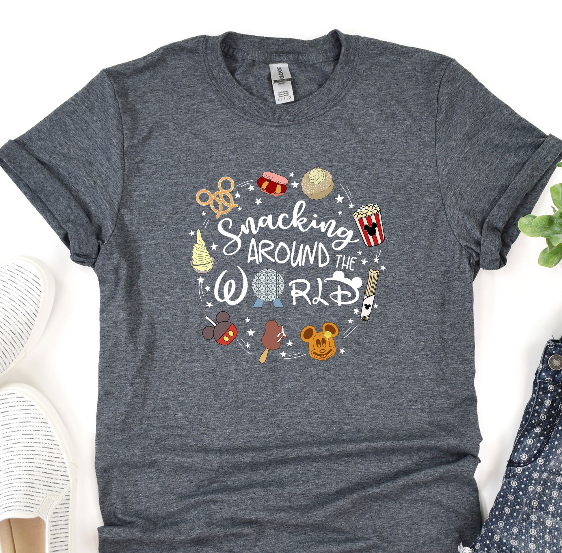 a t - shirt that says snacking around the world