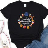 a black t - shirt with mickey mouses around the world on it