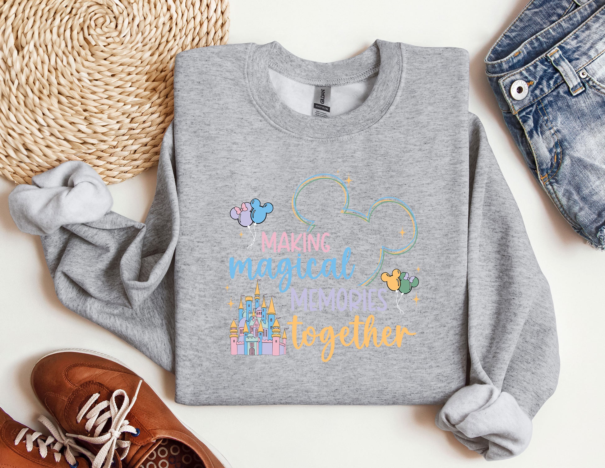 a gray sweatshirt with a mickey mouse message on it