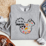 a gray sweatshirt with a mickey mouse design on it