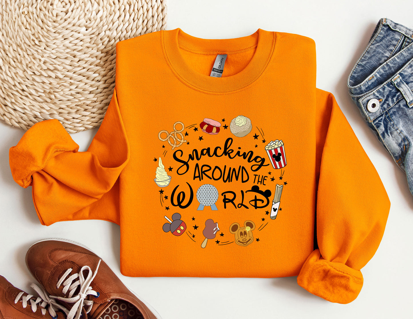 an orange shirt with the words dancing around the world on it