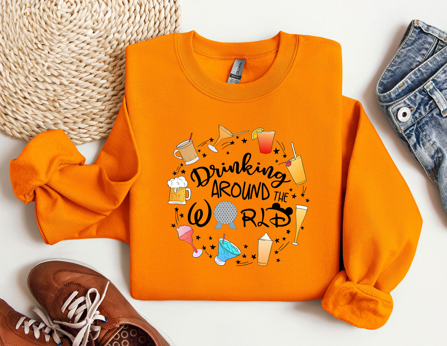 an orange shirt that says drinking around the world