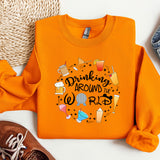 an orange shirt that says drinking around the world