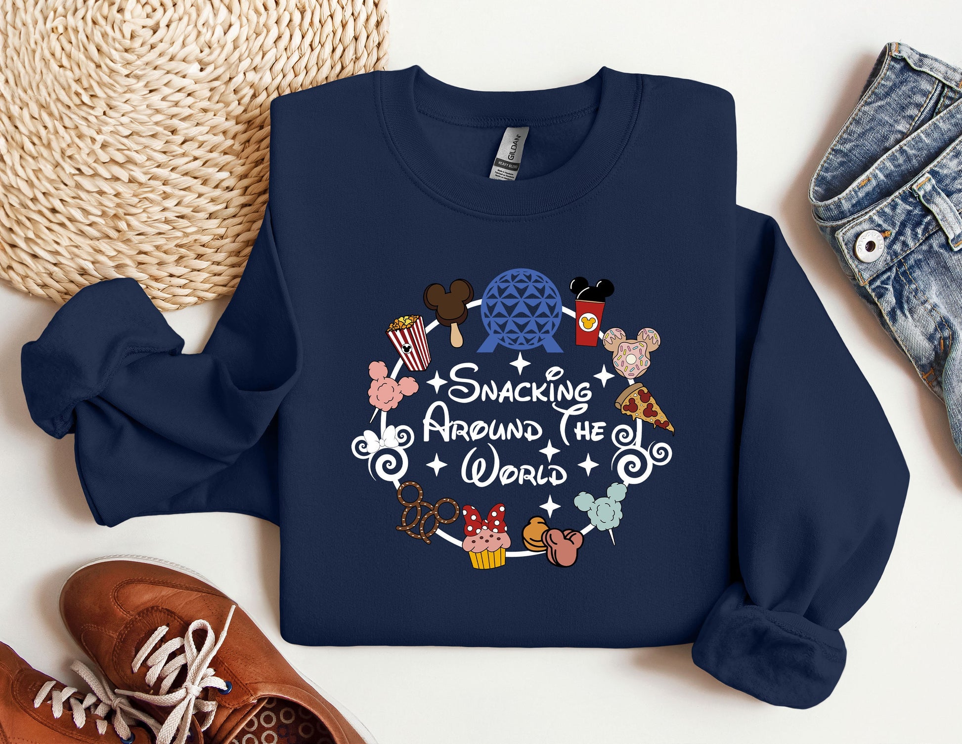 a blue sweatshirt with some disney characters on it