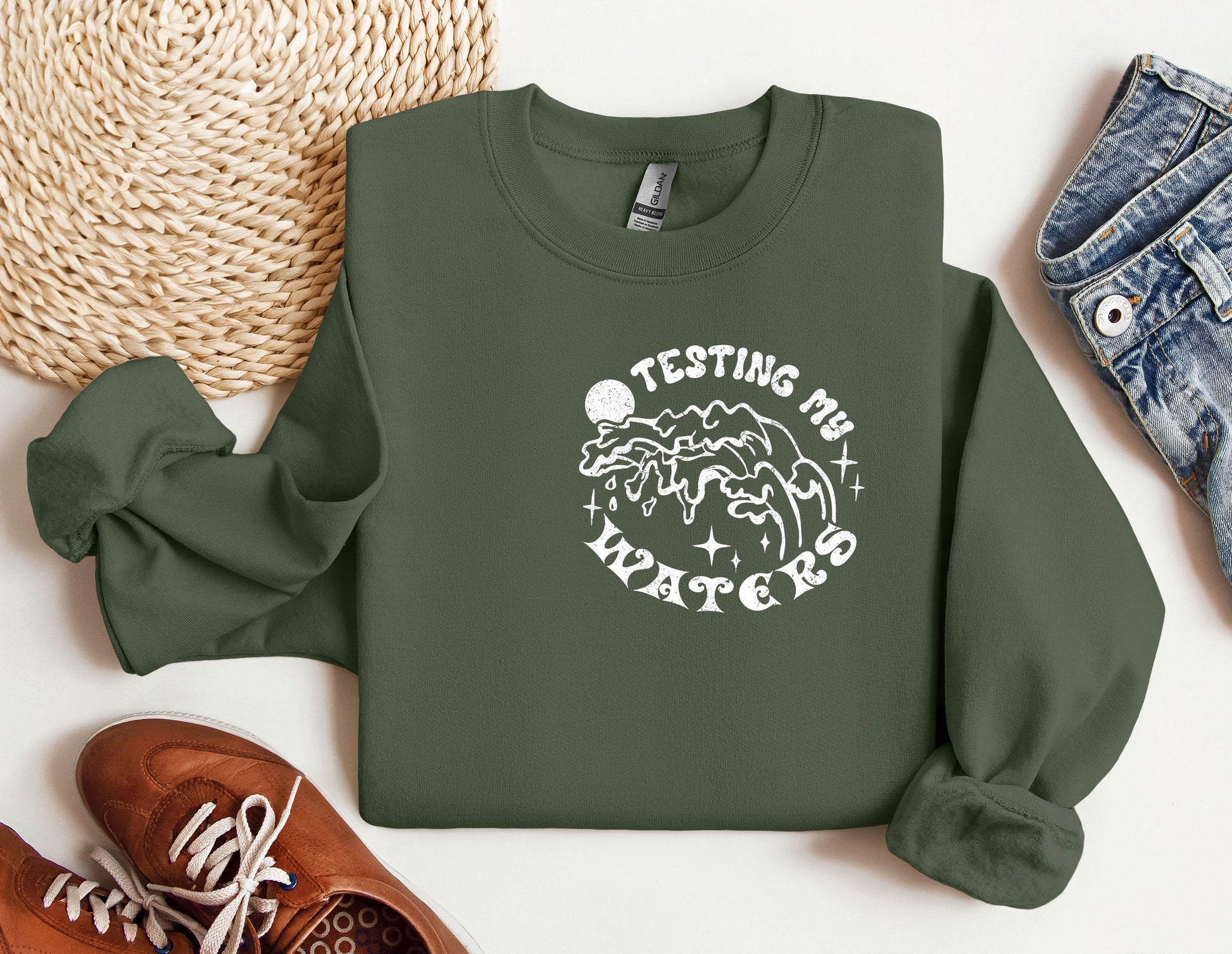 a green sweatshirt with the words, my shittest santa on it