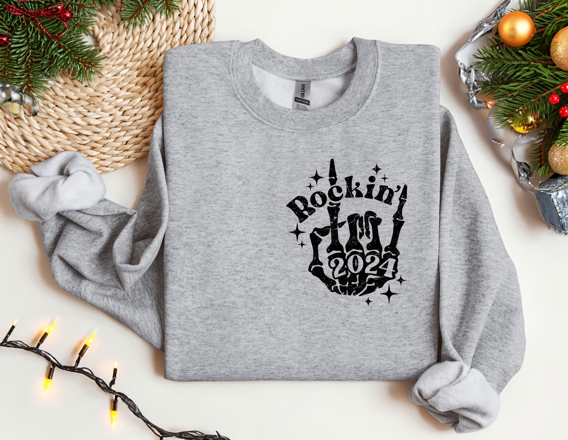 a gray sweatshirt with a rockin&#39;in the 90&#39;s design on it