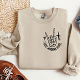 a pair of shoes and a sweatshirt with a peace sign on it