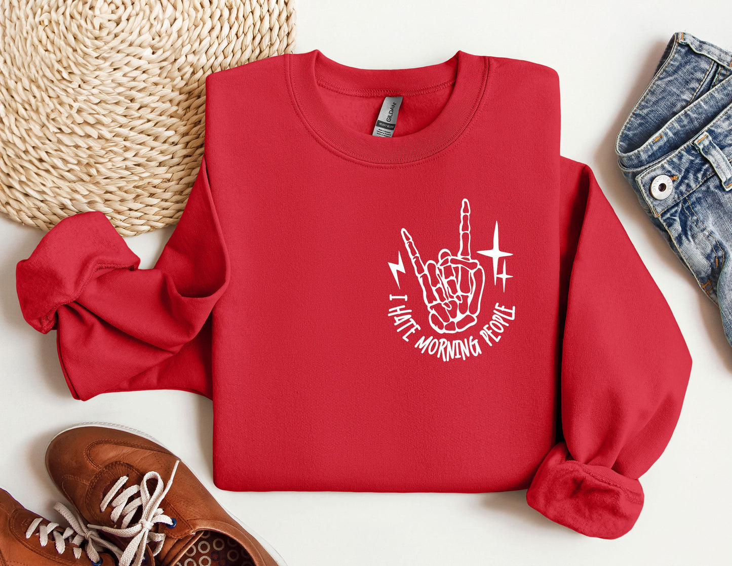 a red sweatshirt with a white print on it