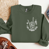 a green sweatshirt with a white graphic on it