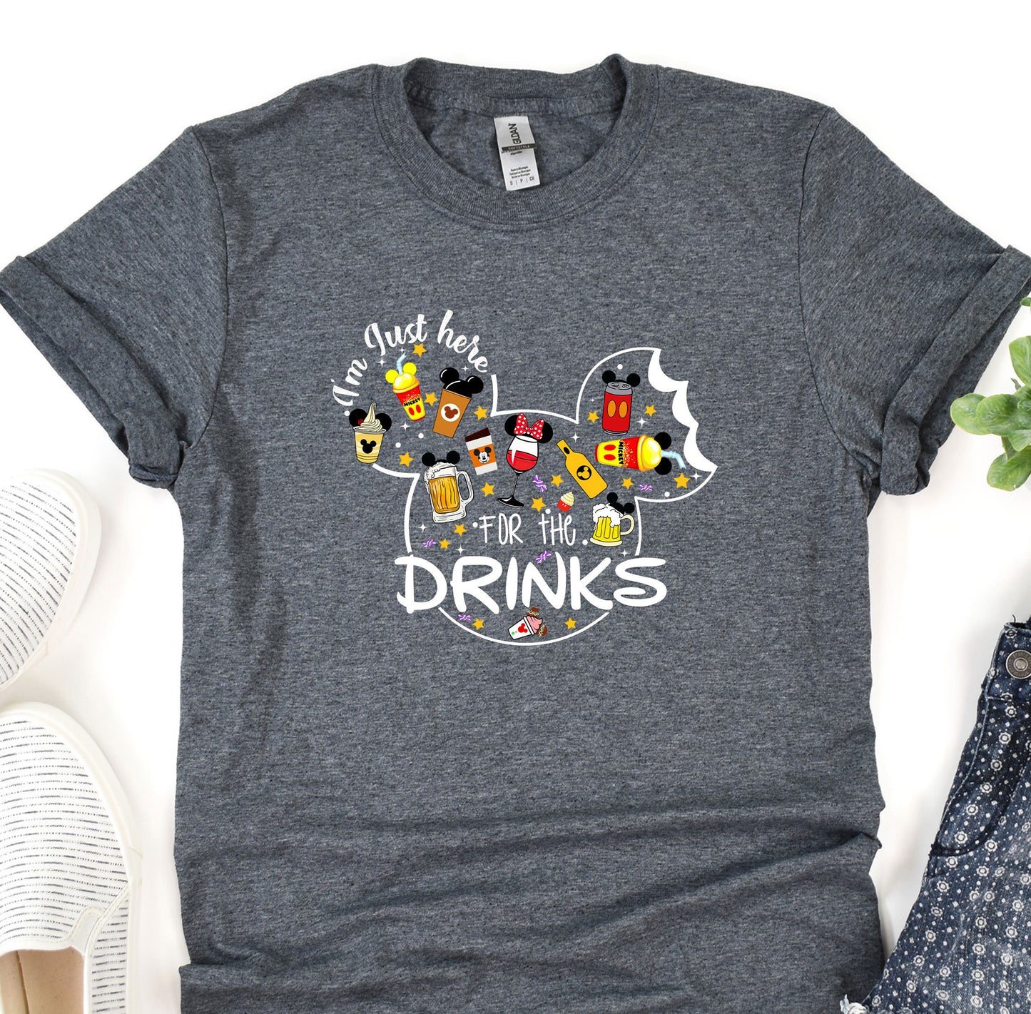 a mickey mouse shirt with the words drink for the drinks on it