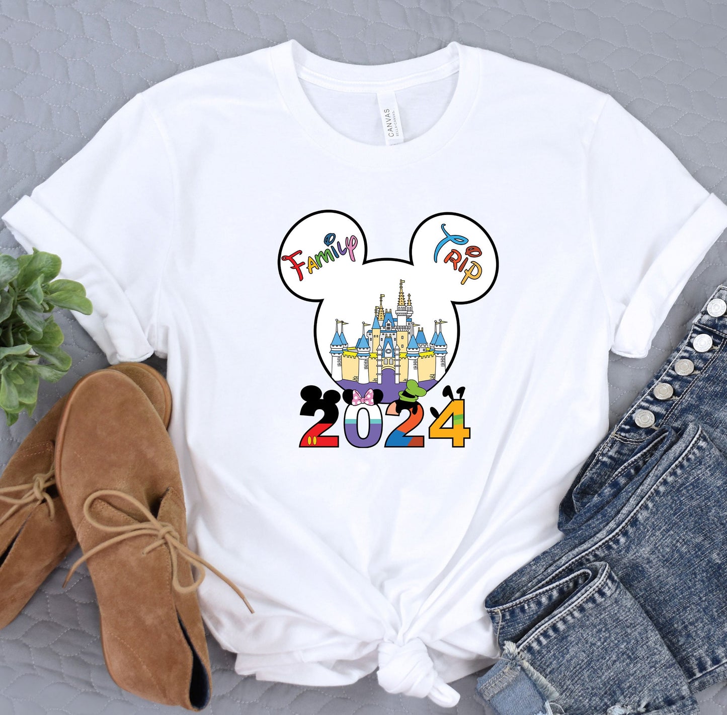 a white shirt with a mickey mouse mouse ears on it