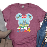 a purple shirt with mickey mouse on it