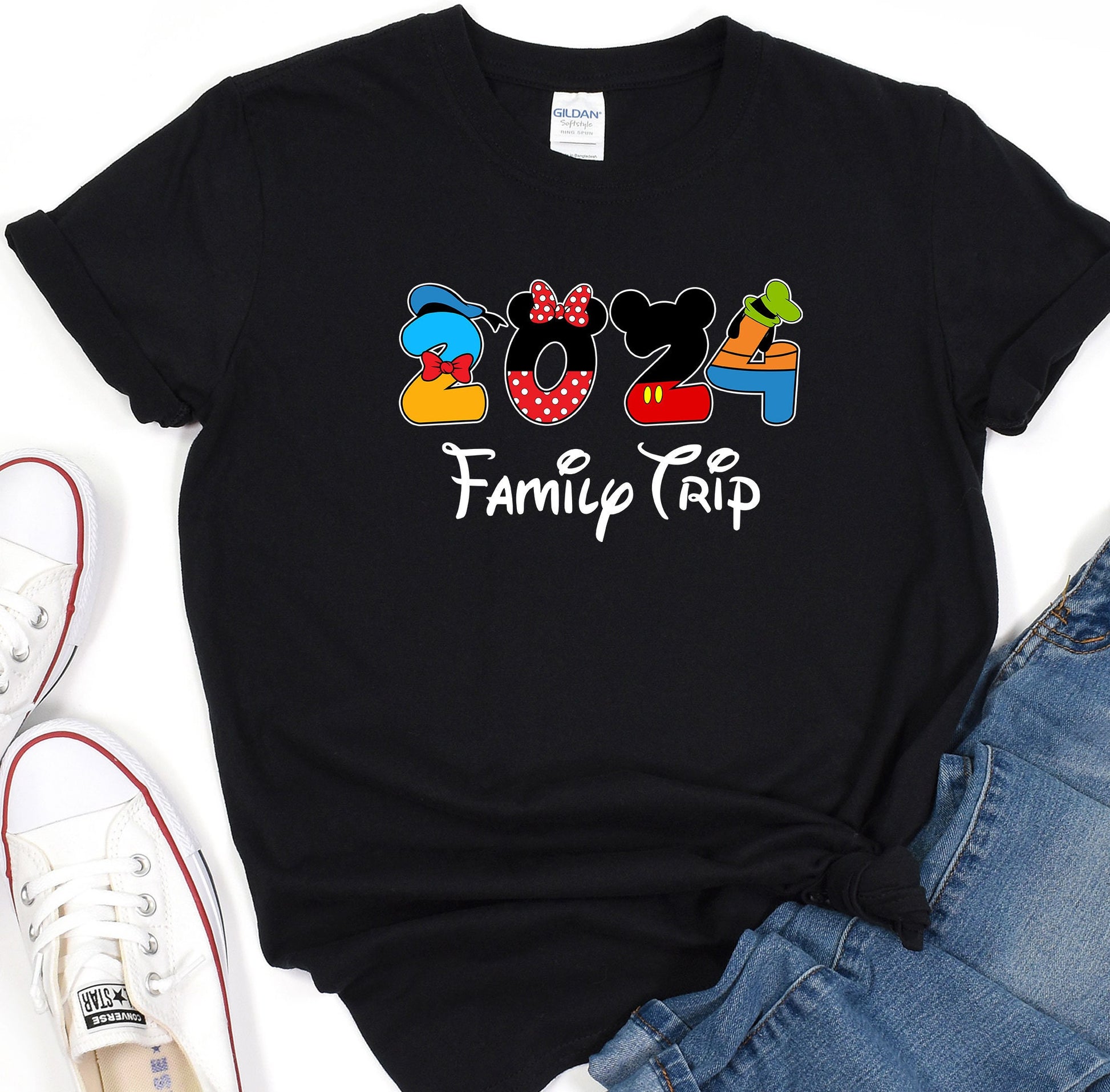 a mickey mouse family trip t - shirt on a white background