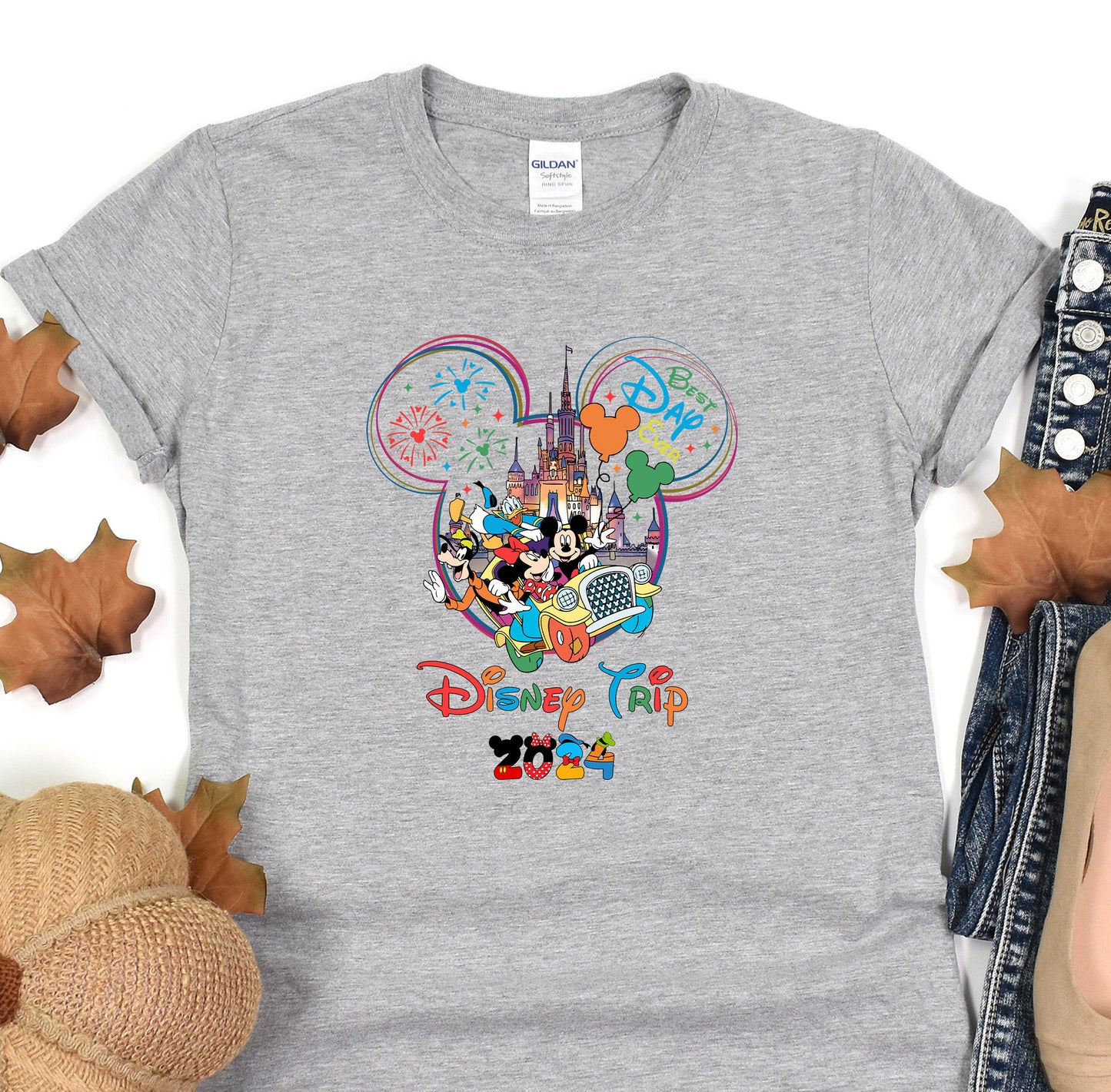 a gray shirt with mickey mouse on it