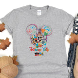 a gray shirt with mickey mouse on it
