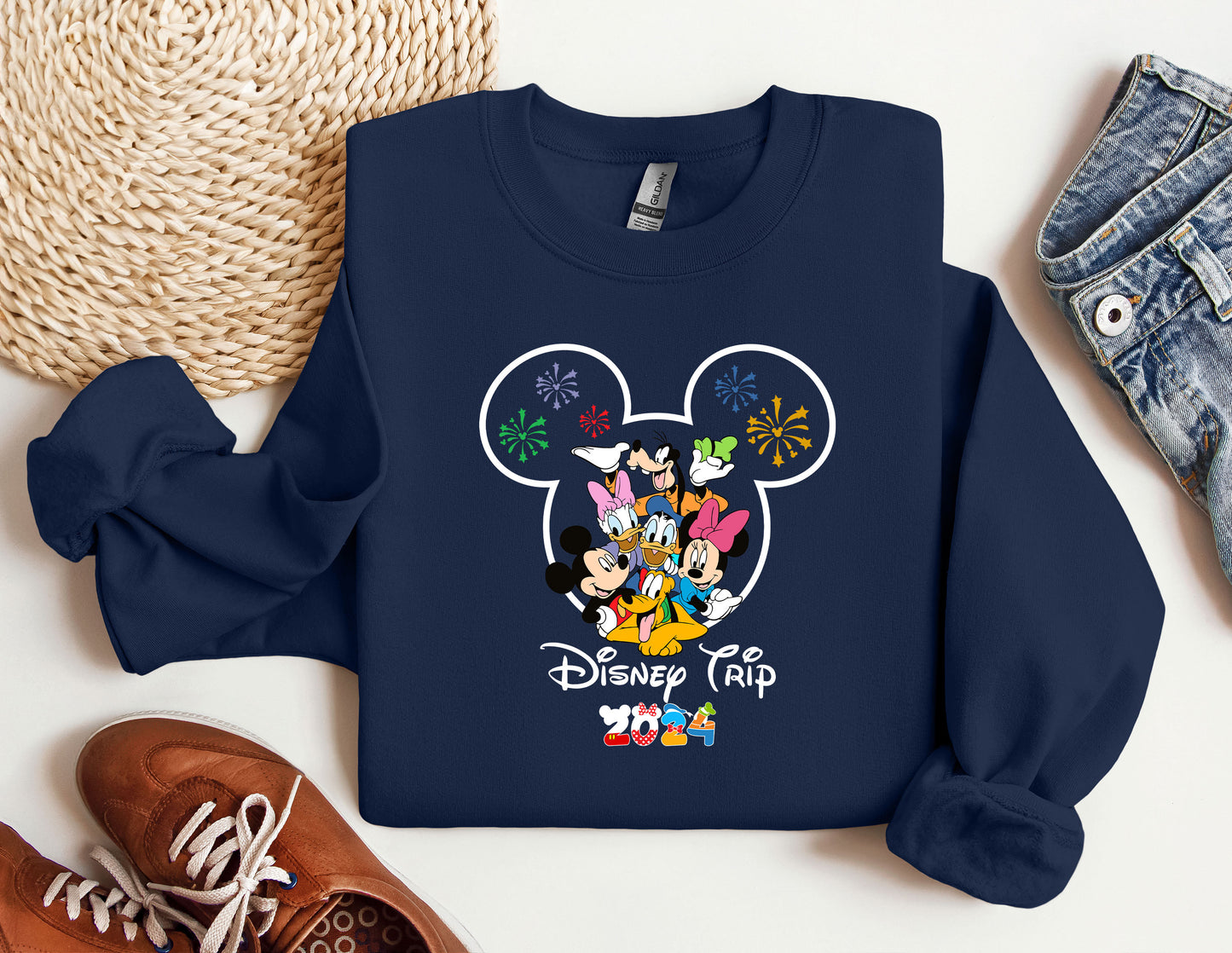 a blue sweatshirt with mickey mouse on it