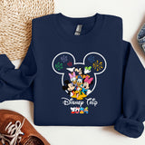 a blue sweatshirt with mickey mouse on it