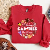 a red sweatshirt with the words disney calories don't count on it