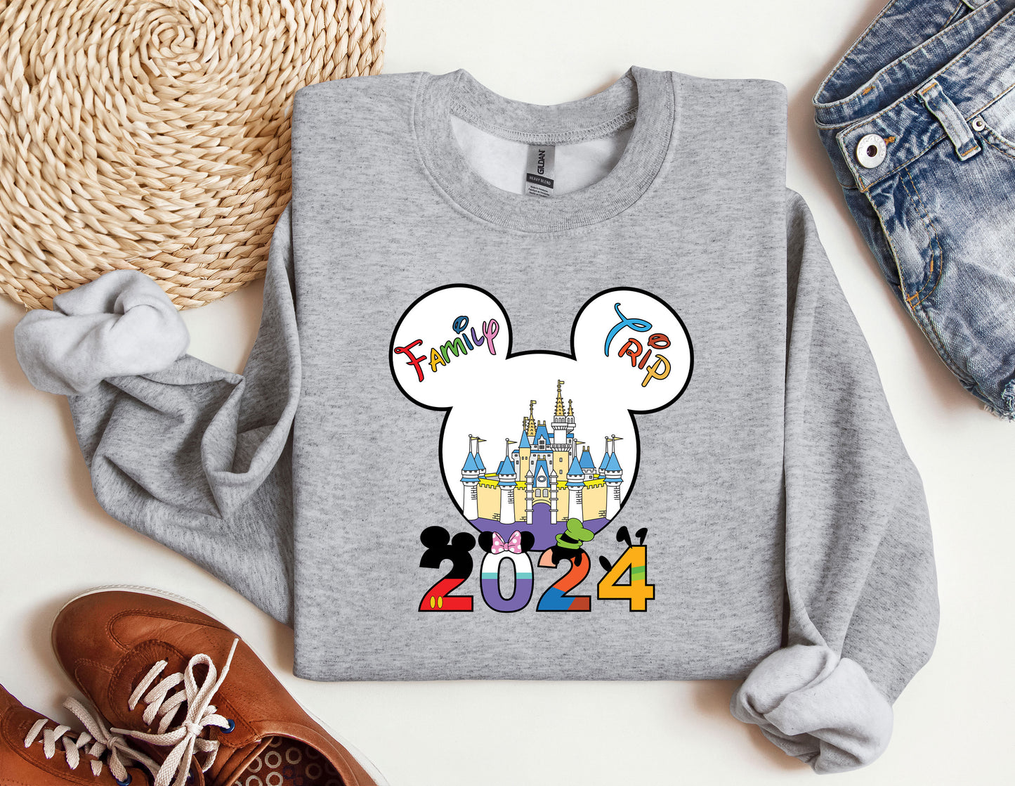 a gray shirt with a mickey mouse head on it