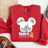 a red shirt with a mickey mouse face on it