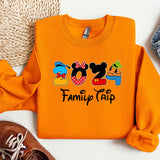 a pair of sneakers and a sweatshirt with mickey mouse on it