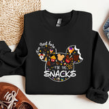 a mickey mouse shirt with the words i'm not too into the snacks on