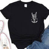 a black t - shirt with a peace sign on it