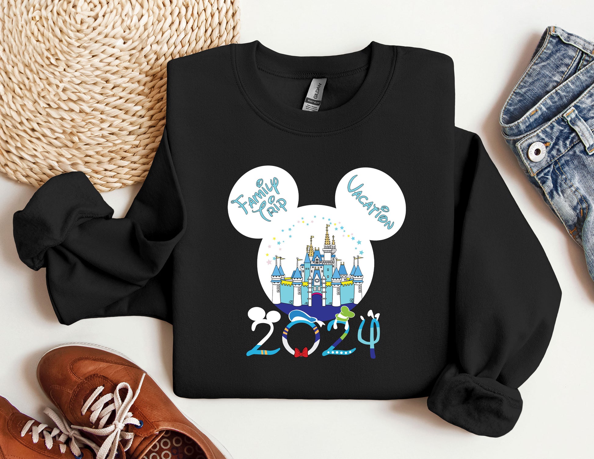 a black shirt with a mickey mouse head on it