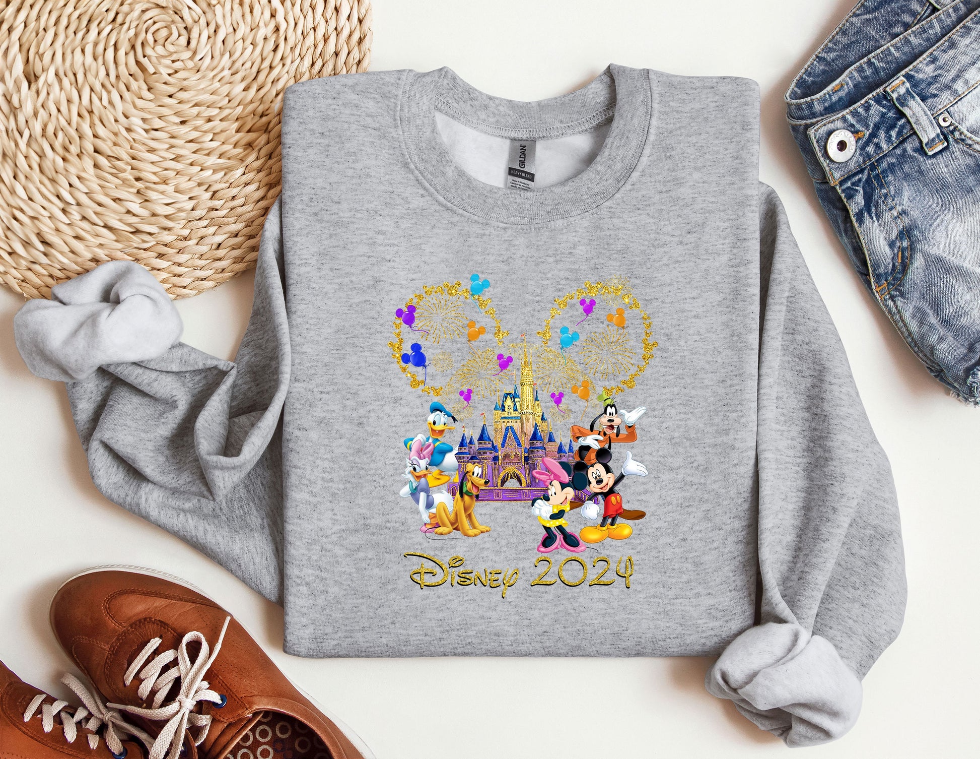 a sweatshirt with mickey mouse and friends on it