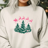 a woman wearing a sweatshirt with a christmas tree and santa's sleigh